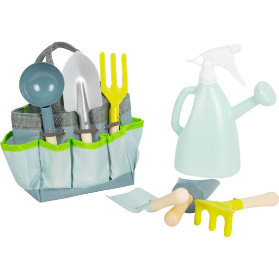 V tašce jsou všechny nástroje, které děti potřebují pro práci na zahradě.