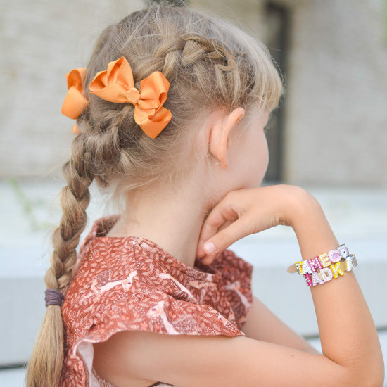 Oranžová mašle do vlasů pro děti 7 cm Busy Lizzie.