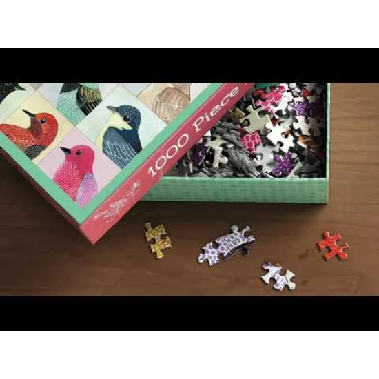 Fóliové puzzle od Michaela Storringse představuje ducha hračkářské vánoční dílny.