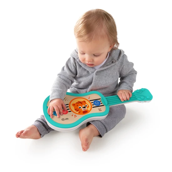 Hudební hračka dřevěná ukulele Magic Touch HAPE 6m+ Baby Einstein 12609-6