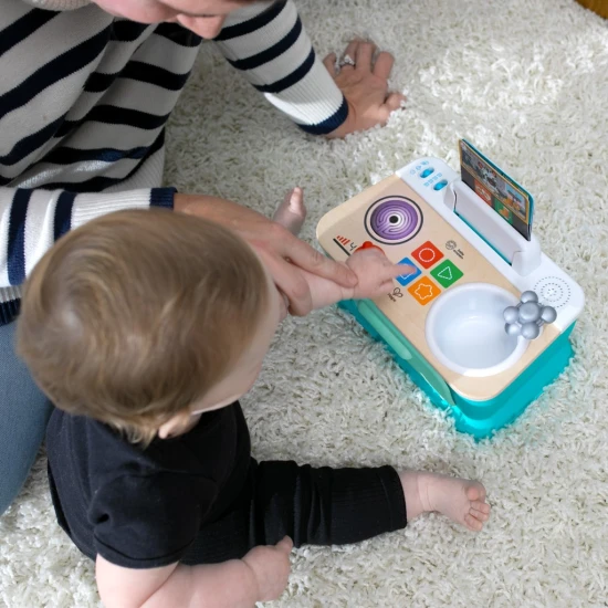 Hudební hračka Kuchyňka Magic Touch Kitchen™ Pretend to Cook HAPE 9m+ Baby Einstein 12933-6
