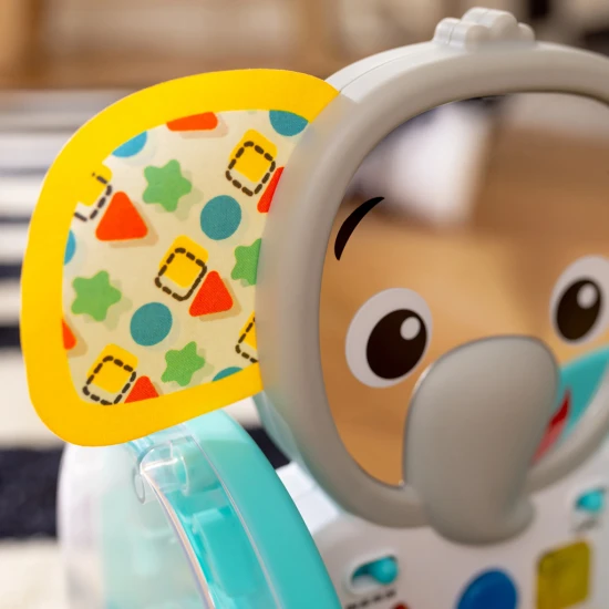 Baby Einstein Hudební slon Válejte se, zkoumejte a učte se s interaktivní plazící hračkou Baby Einstein.