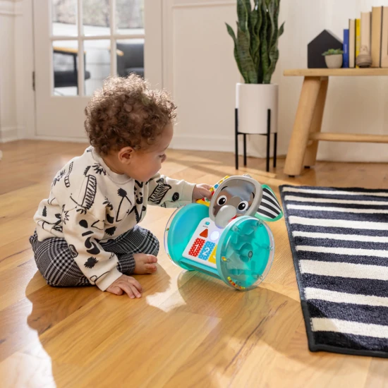 Baby Einstein Hudební slon Válejte se, zkoumejte a učte se s interaktivní plazící hračkou Baby Einstein.