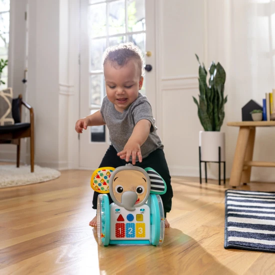 Baby Einstein Hudební slon Válejte se, zkoumejte a učte se s interaktivní plazící hračkou Baby Einstein.