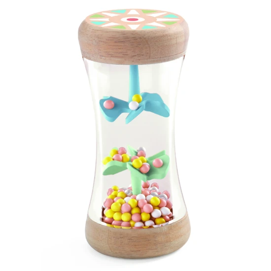 Průhledná trubice chrastítka je uvnitř rozčleněna do několika pater, mezi nimiž se přesypávají drobné kuličky.