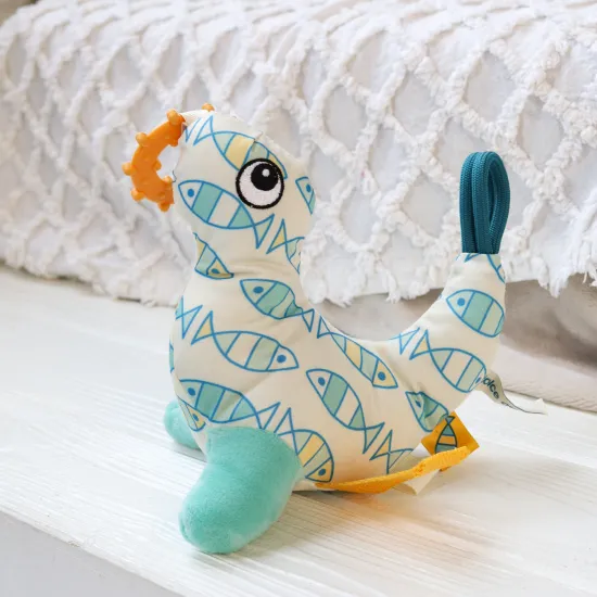 Senzorická hračka Tuleň pro miminka pro rozvoj smyslů Dolce