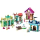 LEGO® stavebnice Disney princezny s trhem, obsahující minifigurky Tiany, Aurory, Popelky a Ariel, sběratelské prsteny a různé herní doplňky. Model zobrazuje trh s květináčem, lavičkou a fontánou.