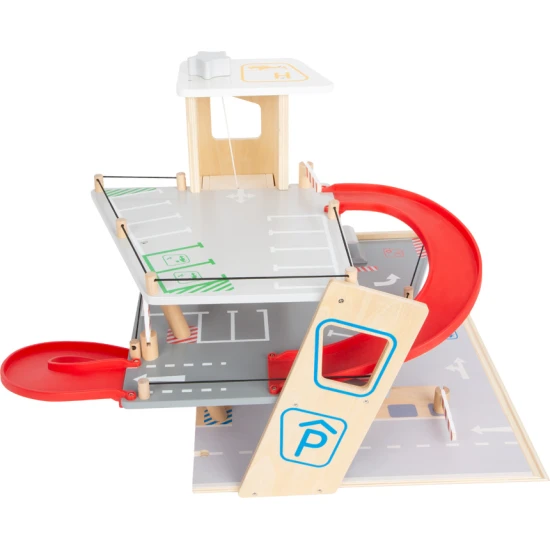 Třípatrová garáž s magnetickými prvky pro malé závodníky.