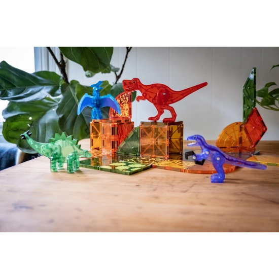 Magnetická stavebnice Dino s dinosaury a barevnými dílky.