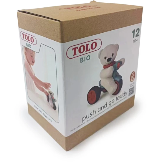 Tolo Medvídek na tříkolce, stisknutím hlavičky se začne hýbat