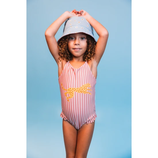 Oboustranný klobouček pro děti s UPF 50+ – květinový vzor na jedné straně, jednobarevný design na druhé. Široký okraj pro ochranu před sluncem.