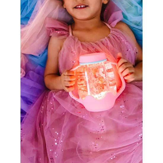 Glo Pals Senzorická láhev Bubble gum: svítící hračka pro děti s růžovým designem.
