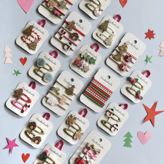 Gumičky do vlasů Vánoce – Zlaté, 4ks Gumičky do vlasů Vánoce – Zlaté, 4ks, třpytivé motivy stromek, hvězda, vločka, lední medvěd