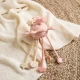 Bieco Silikonová motorická hračka s aktivitami dreamy rose BIECO_20000090