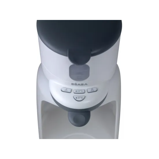 Přístroj na přípravu umělého mléka s funkcí ohřívání láhve s nápojem nebo sklenice s příkrmem.