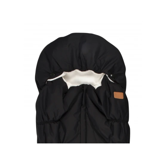 Teplý fusak do kočárku s umělou kožešinou a voděodolným vnějším materiálem, určený k ochraně dětí před chladem a nepříznivým počasím.